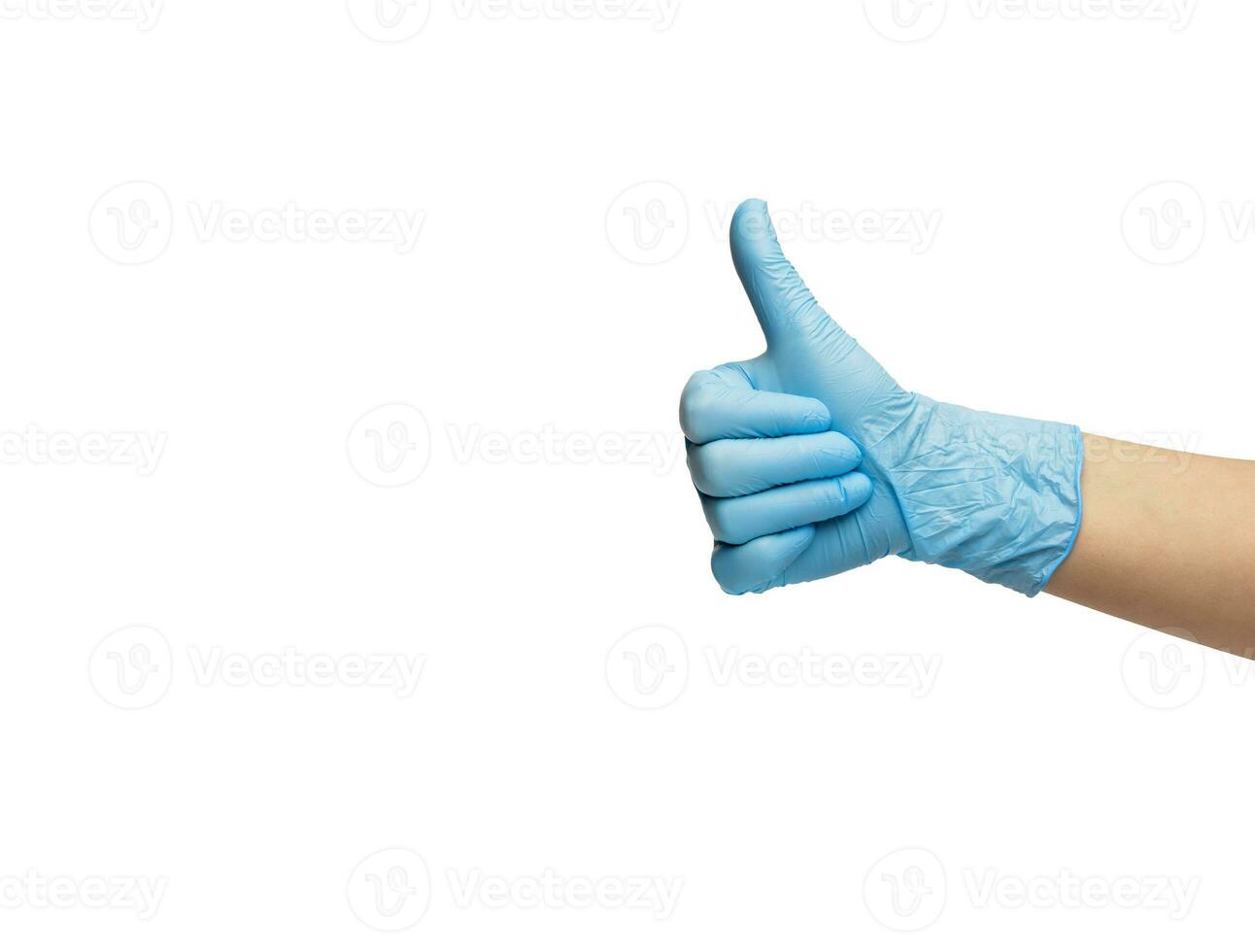 de hand- in de handschoen van de nitril shows de gebaar van de duim omhoog. geïsoleerd Aan een wit achtergrond. hoog kwaliteit foto