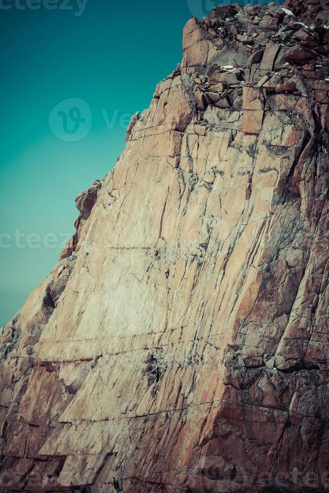 beklimming Aan de top van de berg. foto