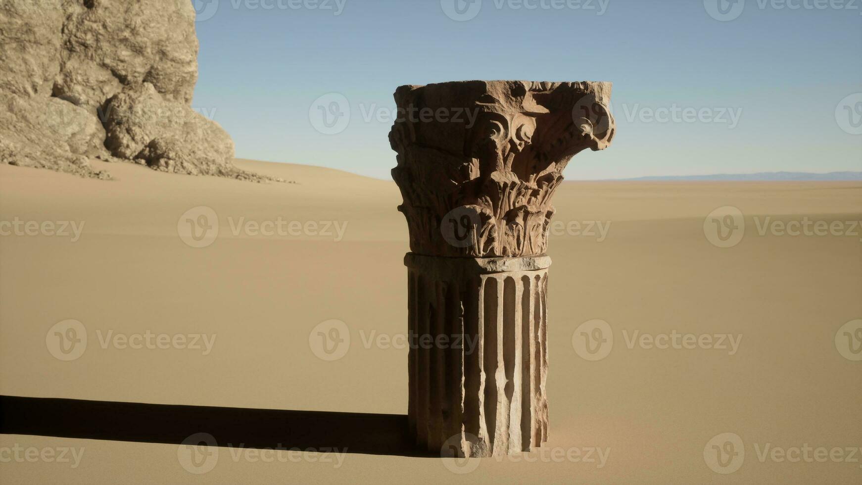 een pijler in de midden- van een woestijn foto