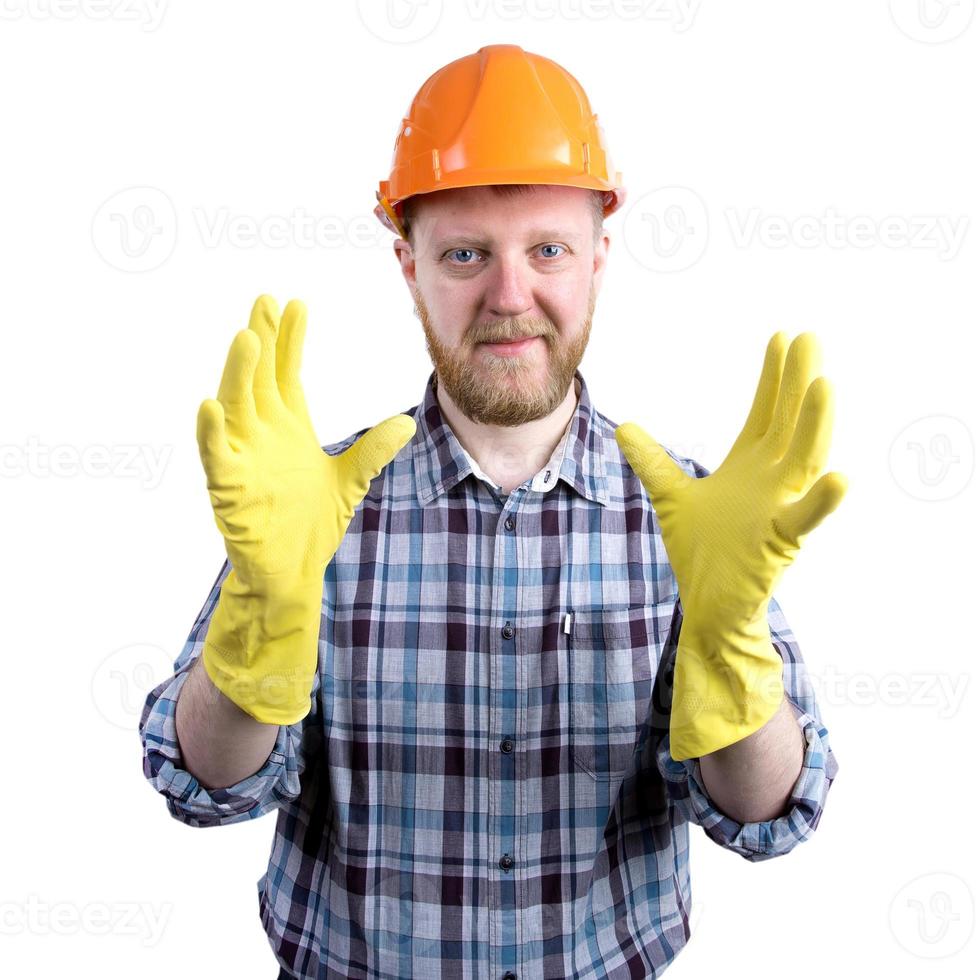 man in een helm en gele handschoenen foto