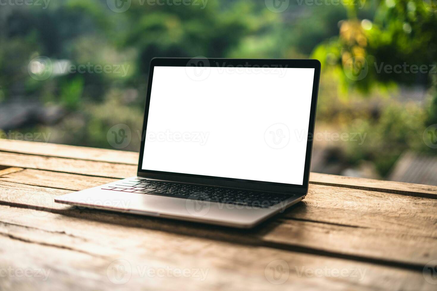 notitieboekje computer Aan de balkon foto