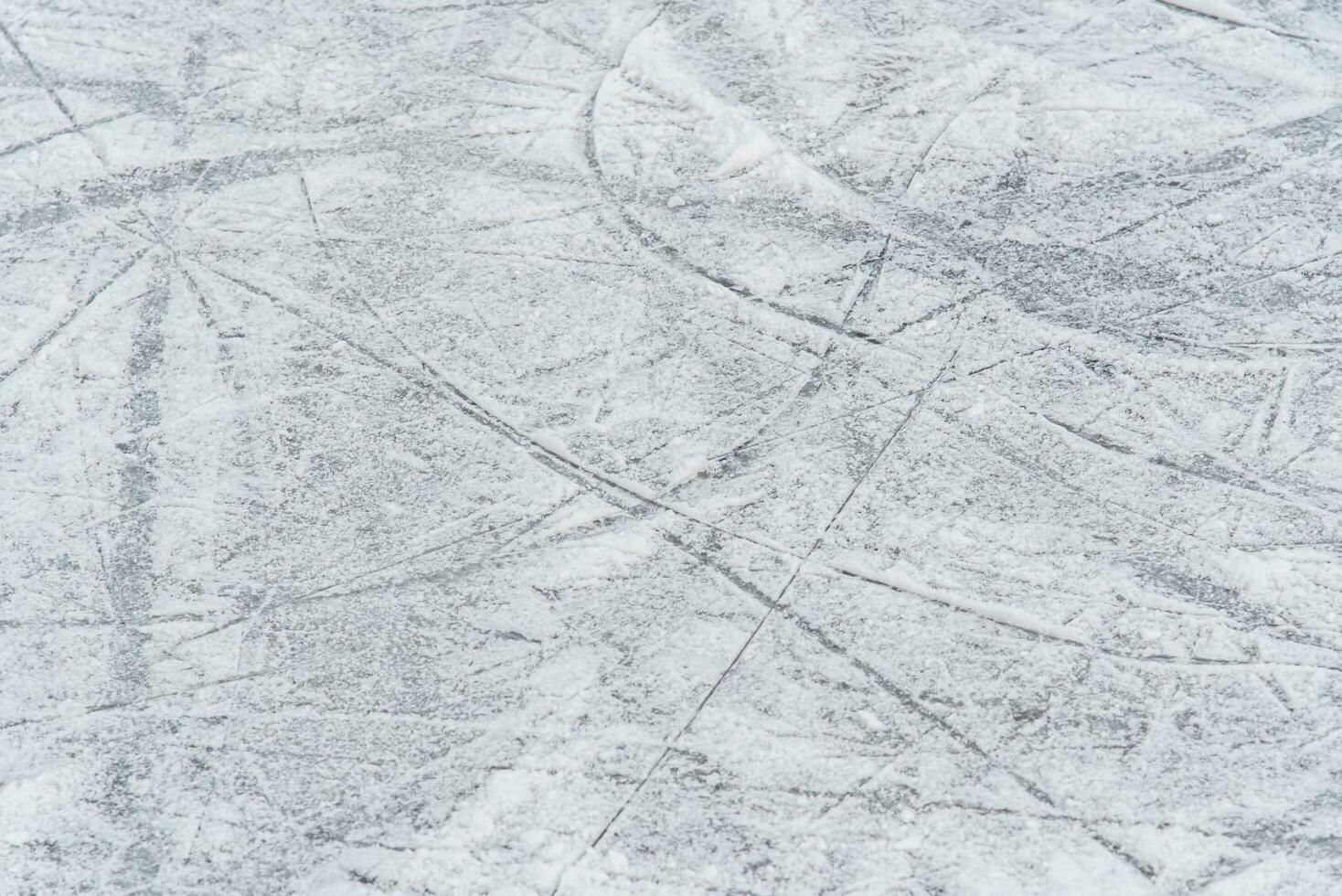 sporen Aan de ijs van skates Aan de baan foto