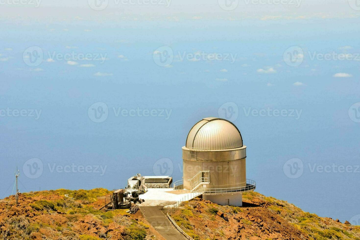 telescoop Aan top van een berg foto