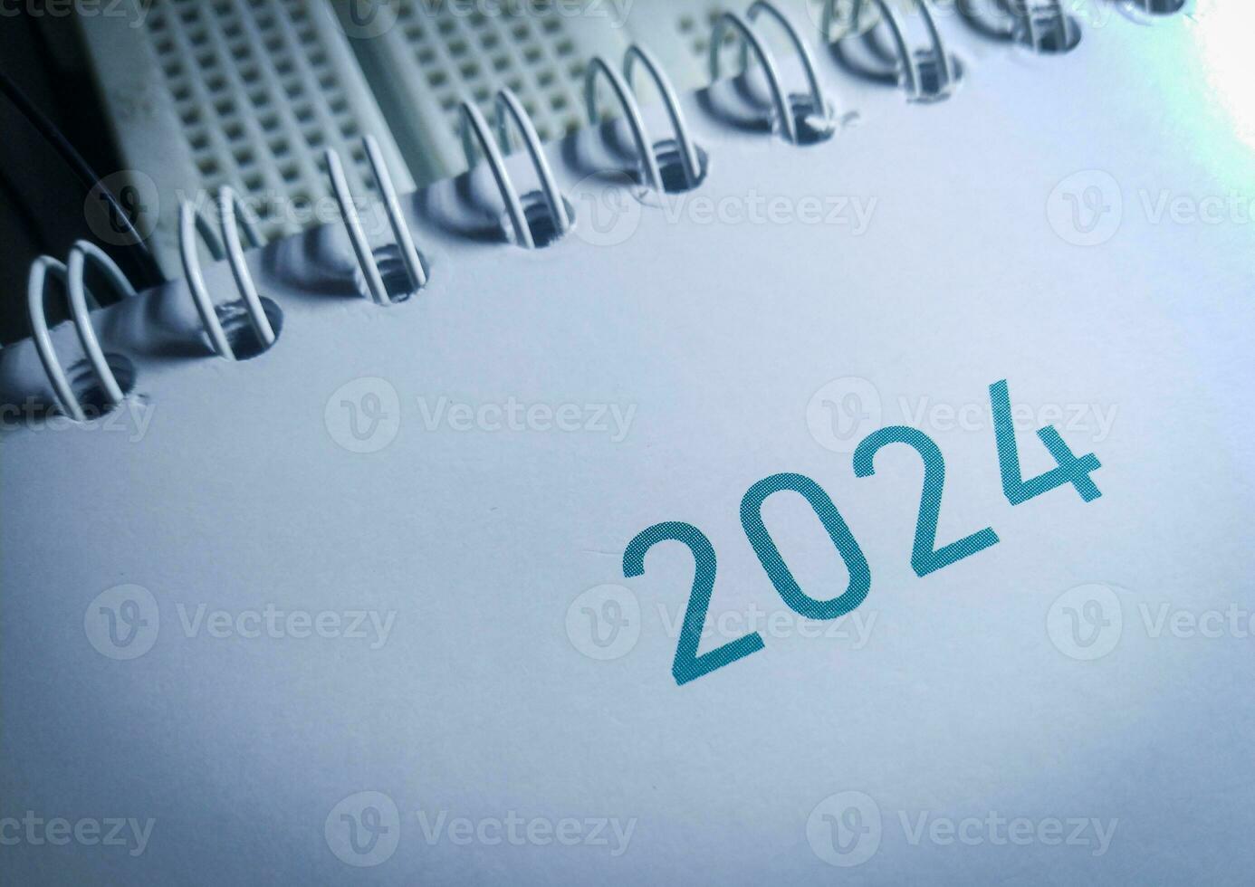 een dichtbij omhoog van 2024 Aan kalender foto