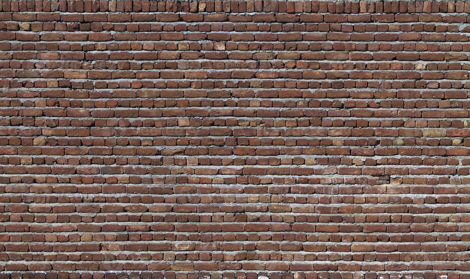 rode bakstenen muur close-up achtergrond foto