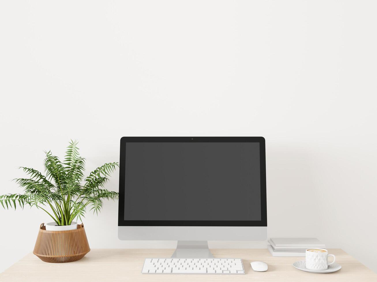 een werkkamer met een computer op de tafel foto