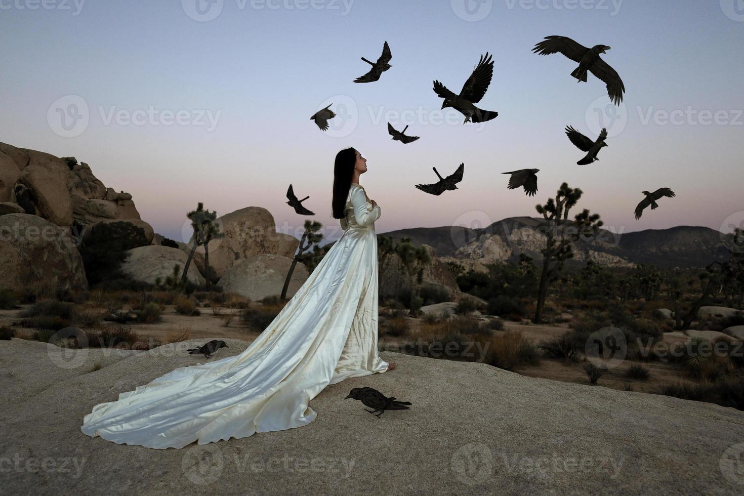 abstract concept van meisje omringd door zwarte vogels die fantasie vertegenwoordigen foto
