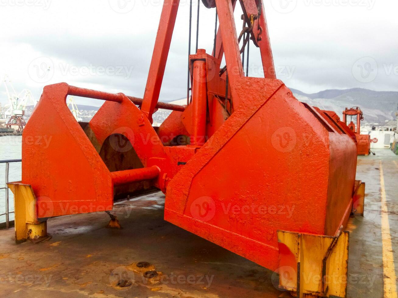 groot emmers voor haven laders. dreglayner, hydraulisch en kabel foto