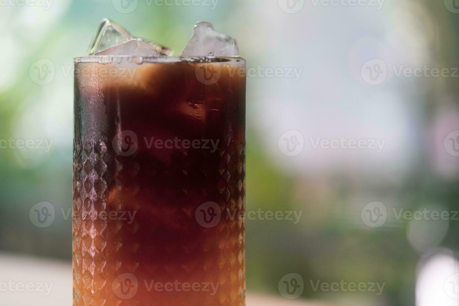 glas van bevroren koffie met oranje sap foto