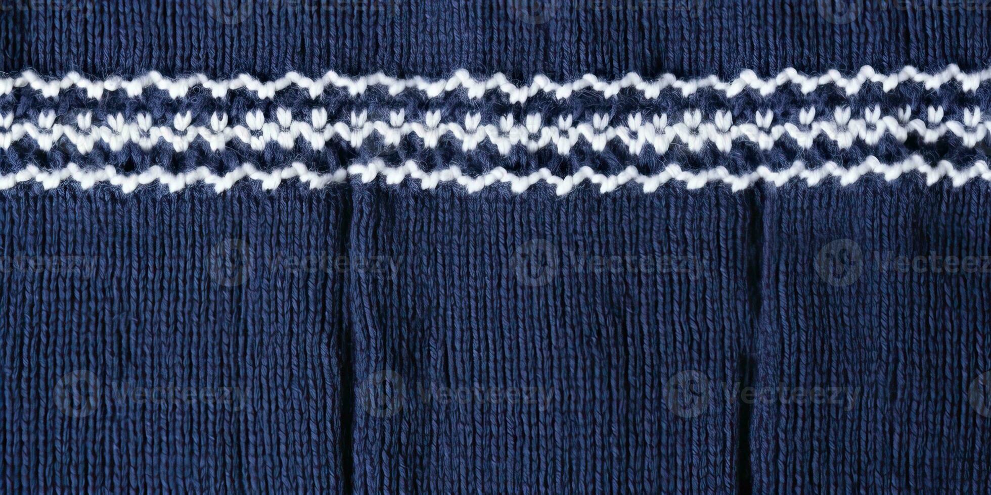 ai gegenereerd wol trui structuur van donker blauw kleur met wit grens. natuurlijk gebreid wol indigo kleur foto