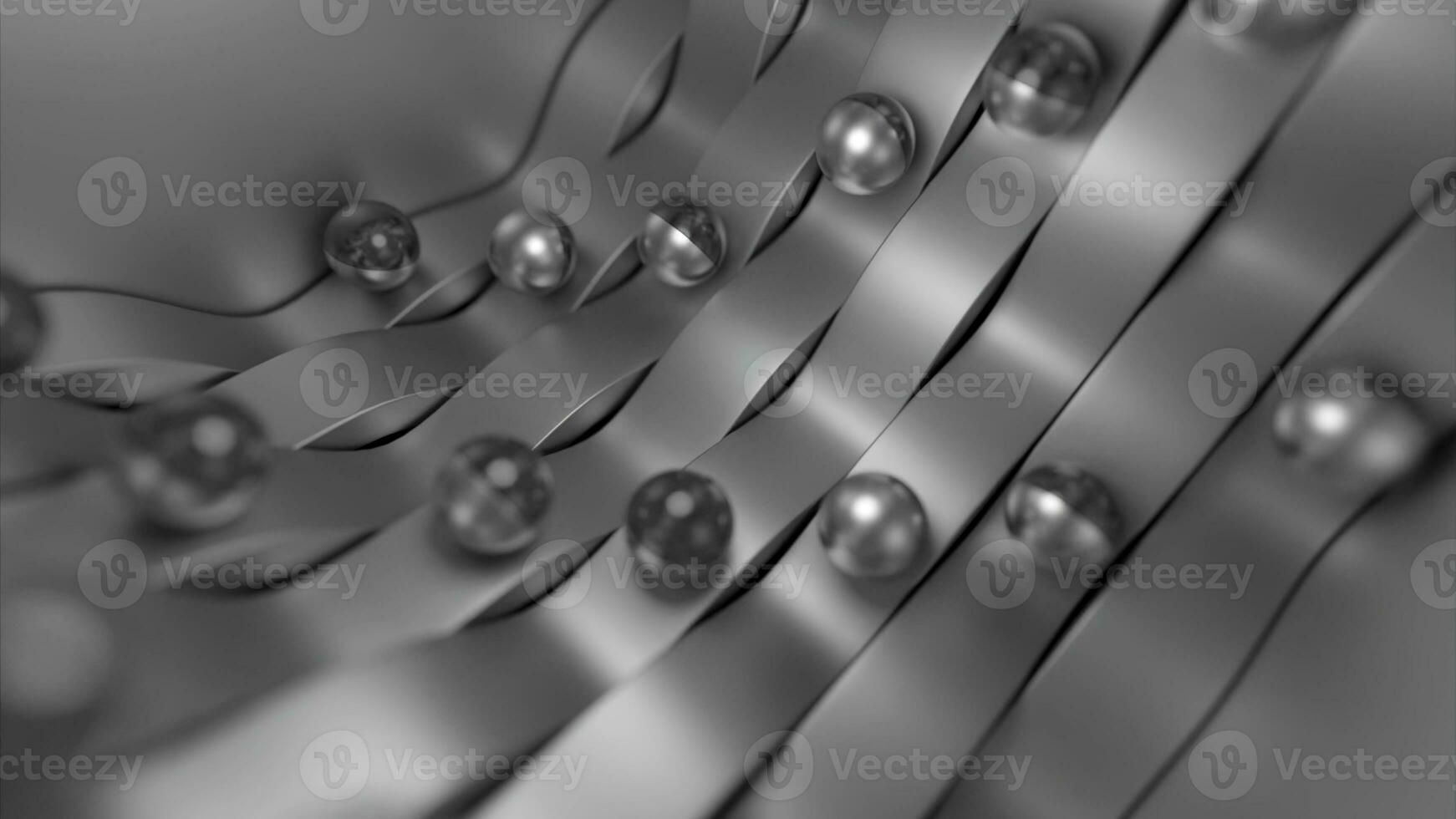 gebogen zilver linten met rollend metaal ballen. ontwerp. metaal gloeiend parels in beweging. foto