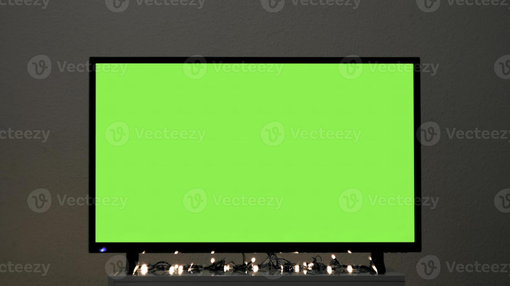 TV groen scherm in leven kamer. concept. chroma sleutel scherm voor reclame. foto