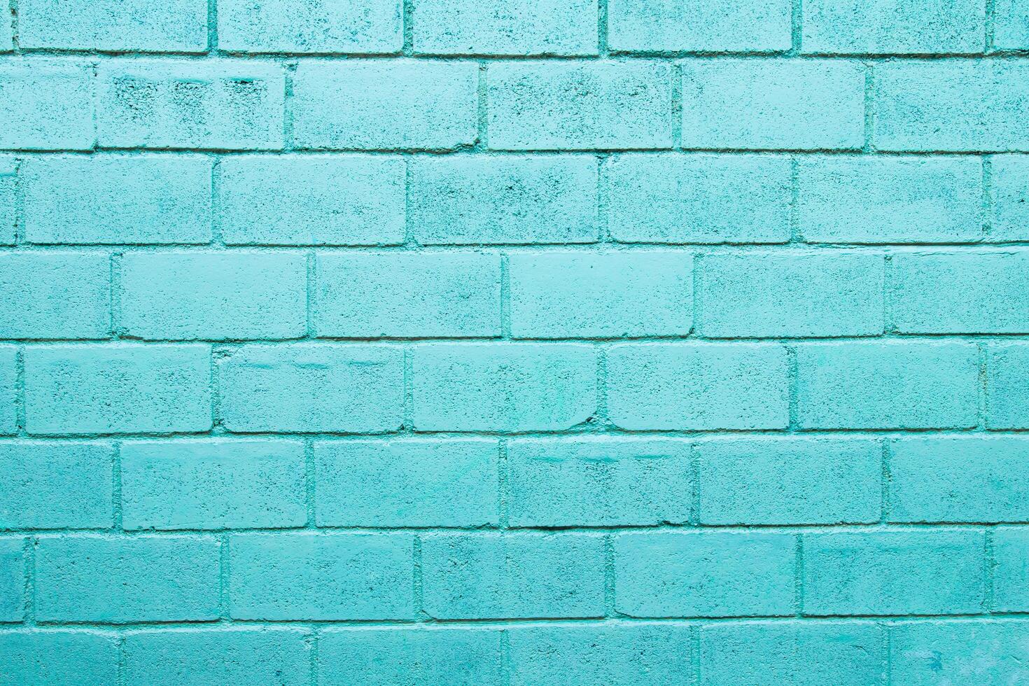 licht groen kleur steen muur dichtbij omhoog beeld rij steen en cement blok achtergrond en structuur foto