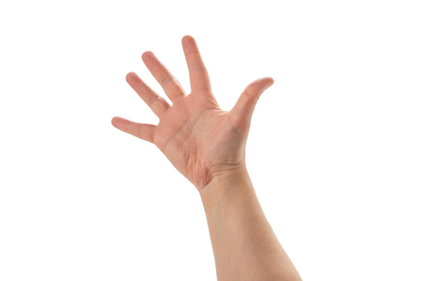man hand met vijf vingers geïsoleerd op een witte achtergrond. foto