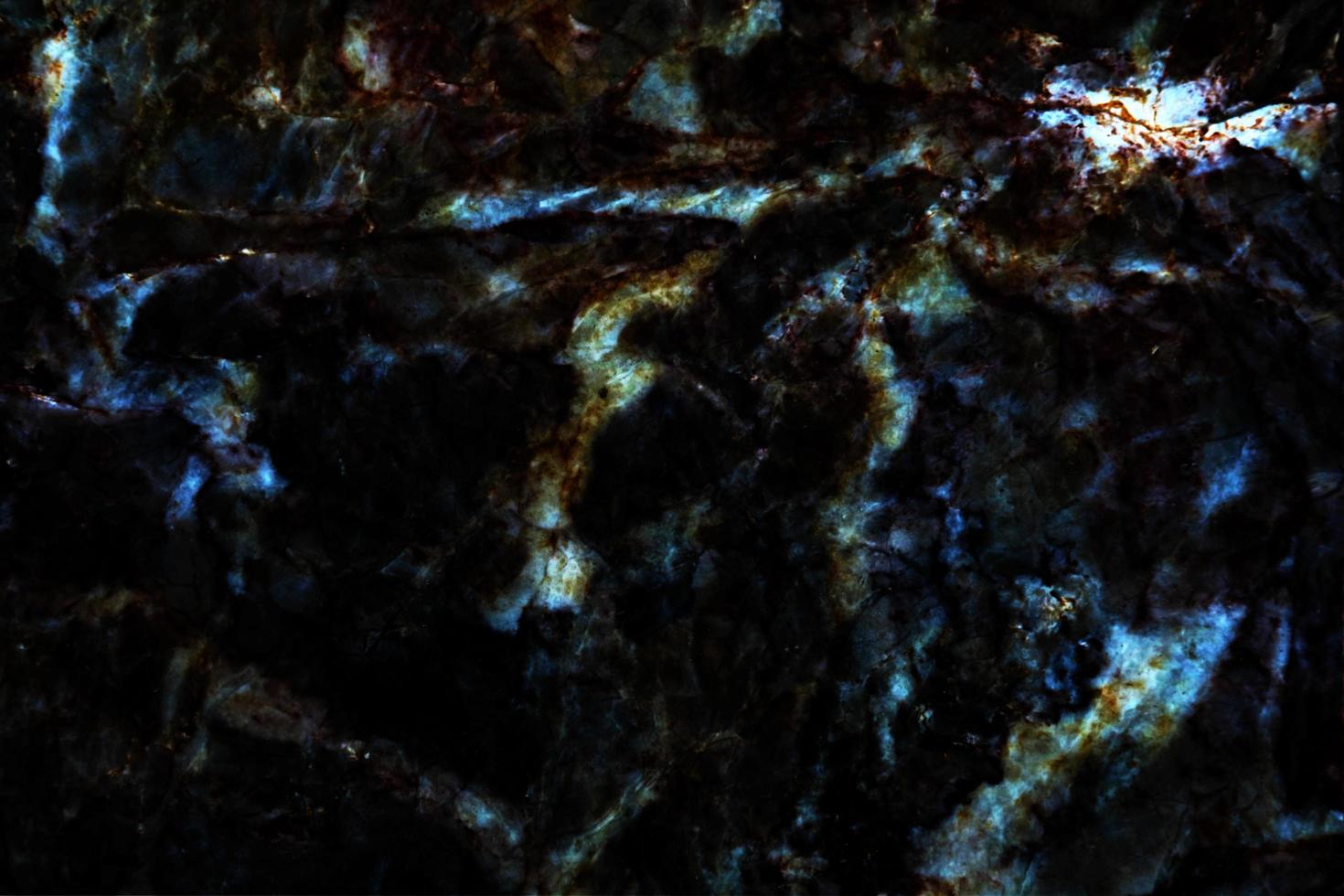 blauwe parel mineraal en donker graniet marmer interieur textuur oppervlak foto