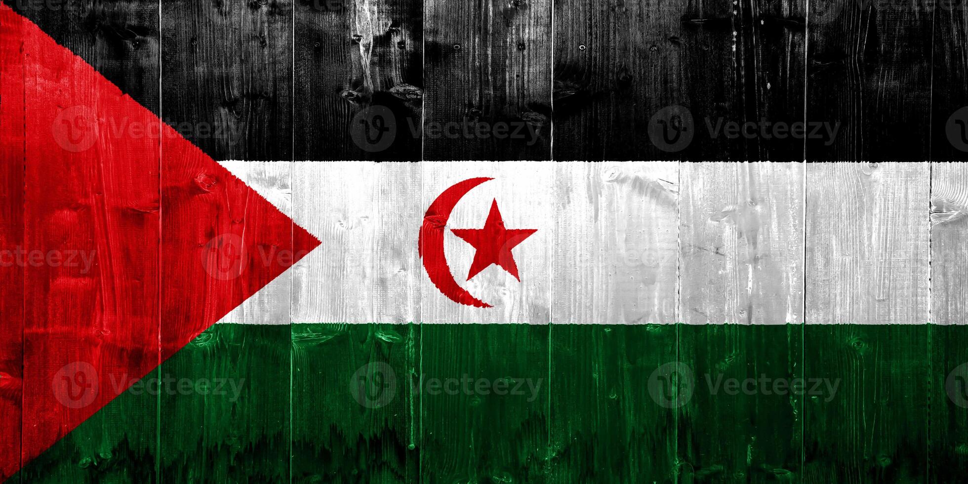 vlag van western Sahara Aan een getextureerde achtergrond. concept collage. foto