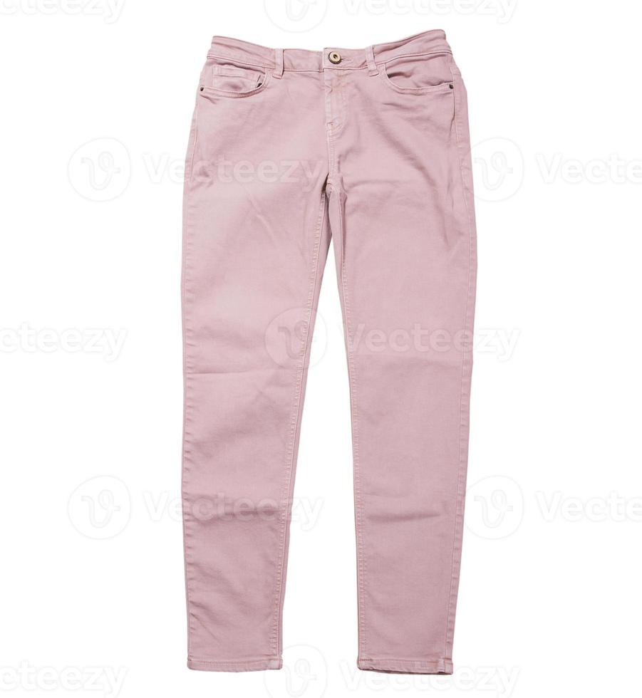vrouwelijke broek, licht roze denim broek bovenaanzicht geïsoleerd op een witte achtergrond, gevouwen slanke broek foto