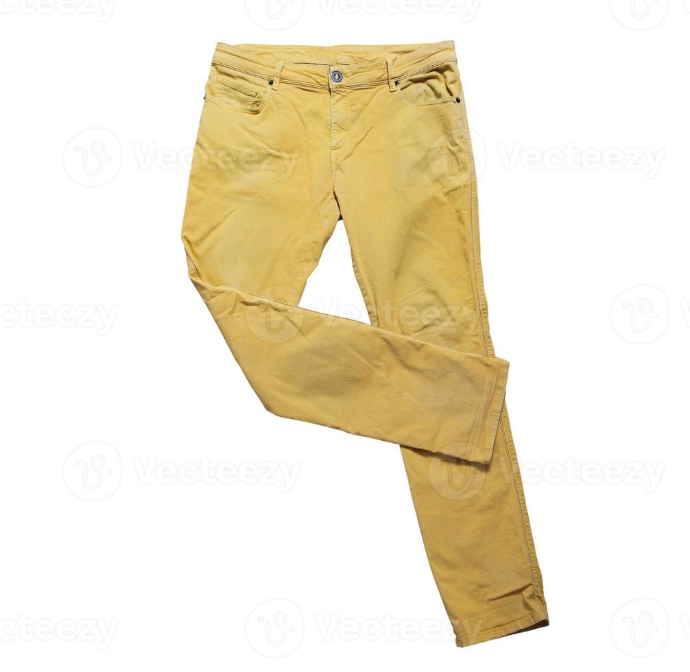 gele broek geïsoleerd, gele jeans broek broek, skinny broek. moderne zakken gele broek voor tieners geïsoleerd op een witte achtergrond. jeugd zomer mode kleding foto