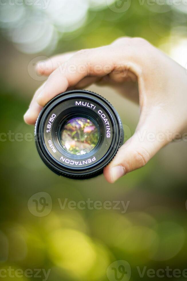 visie van camera lens met bokeh effect foto