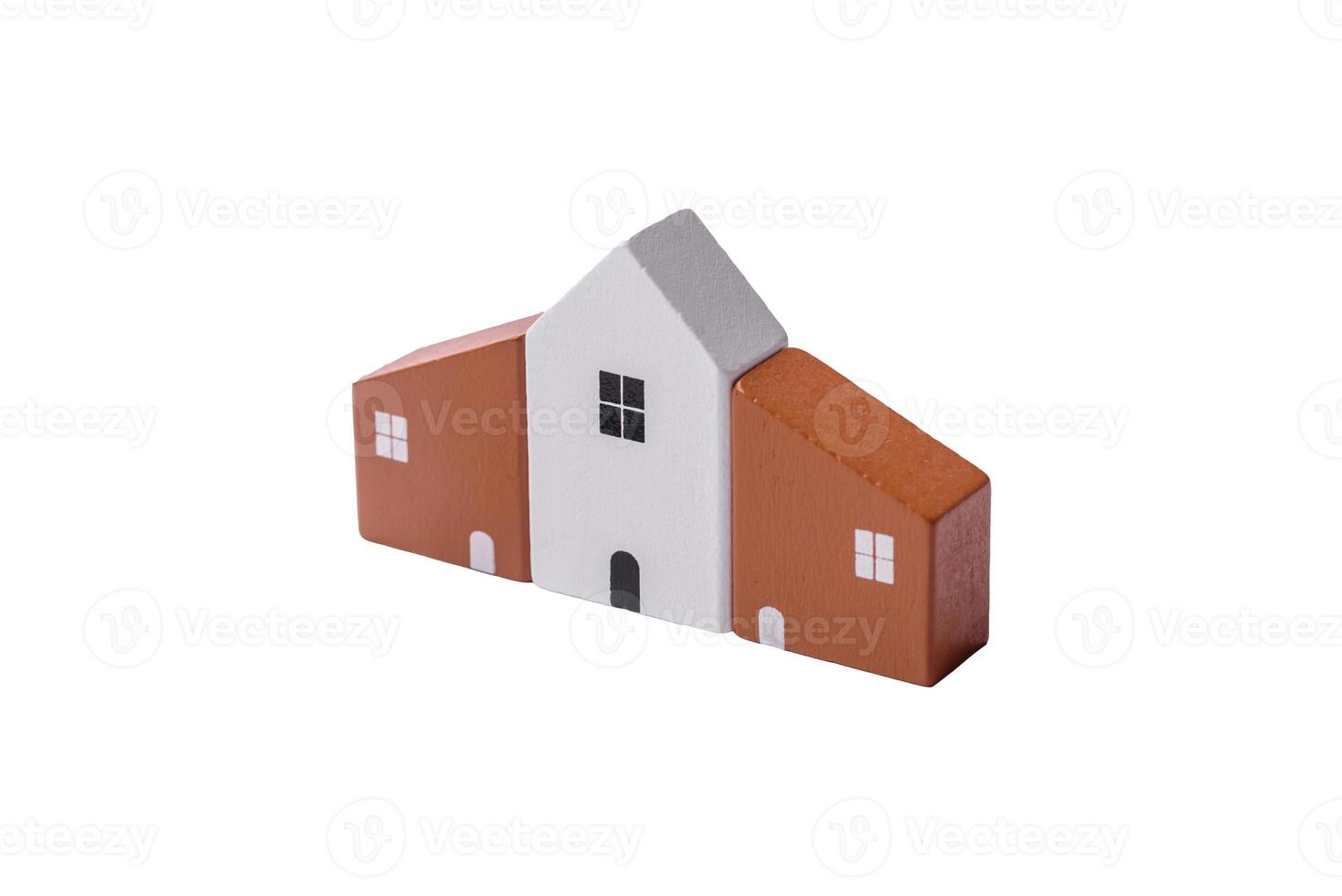 een klein houten huis en sleutels net zo een idee voor investeren in uw eigen huis foto