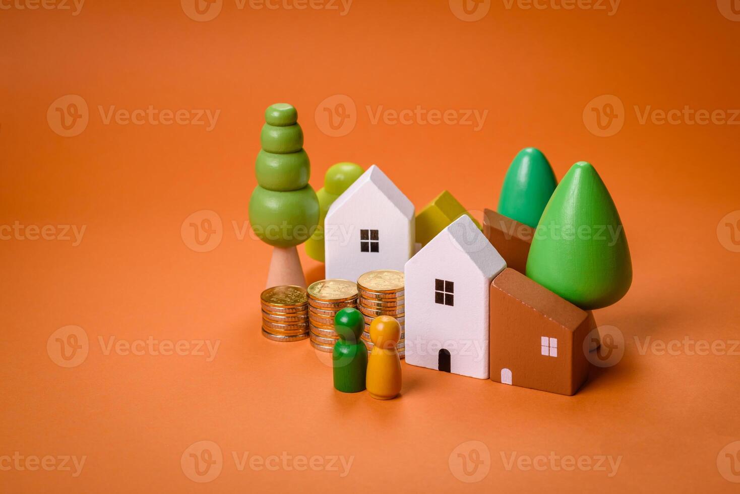 een klein houten huis en sleutels net zo een idee voor investeren in uw eigen huis foto