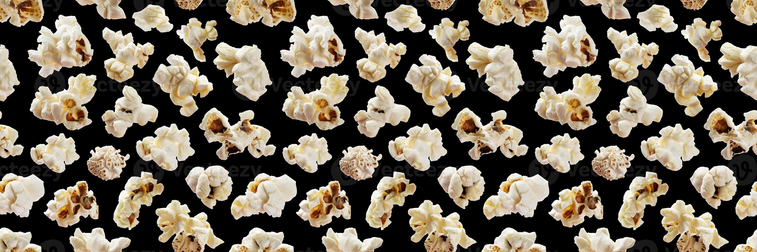 popcorn naadloos patroon. knal maïs Aan zwart achtergrond foto