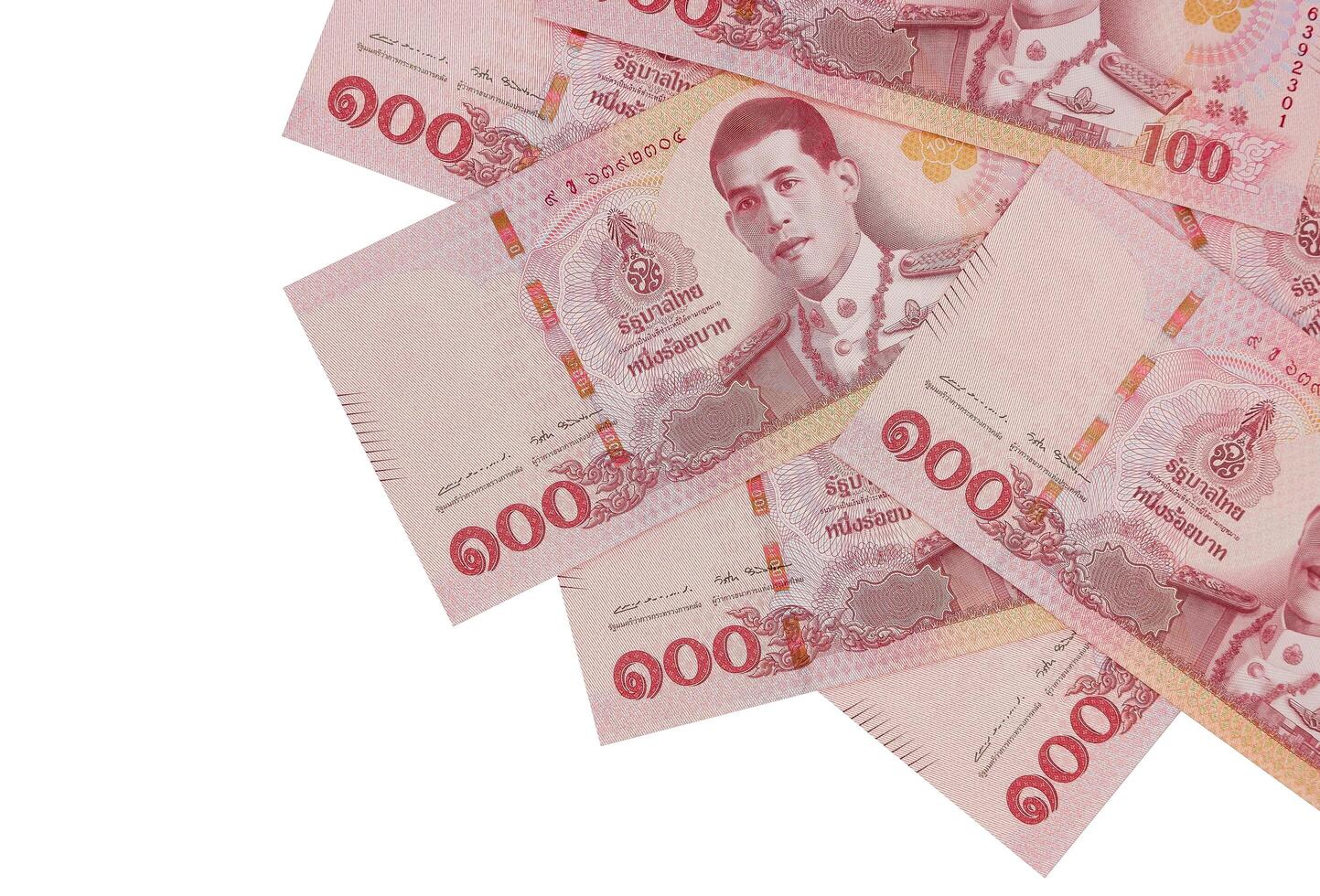 stapel van nieuw 100 Thais baht bankbiljetten. bedrijf en financiën concept. foto