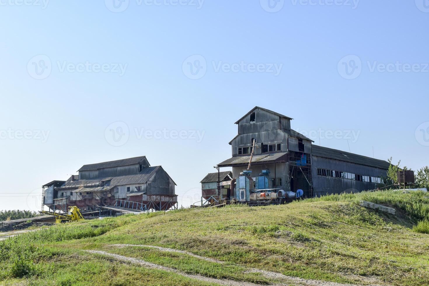 de oud gebouw voor opslaan en gieten graan foto