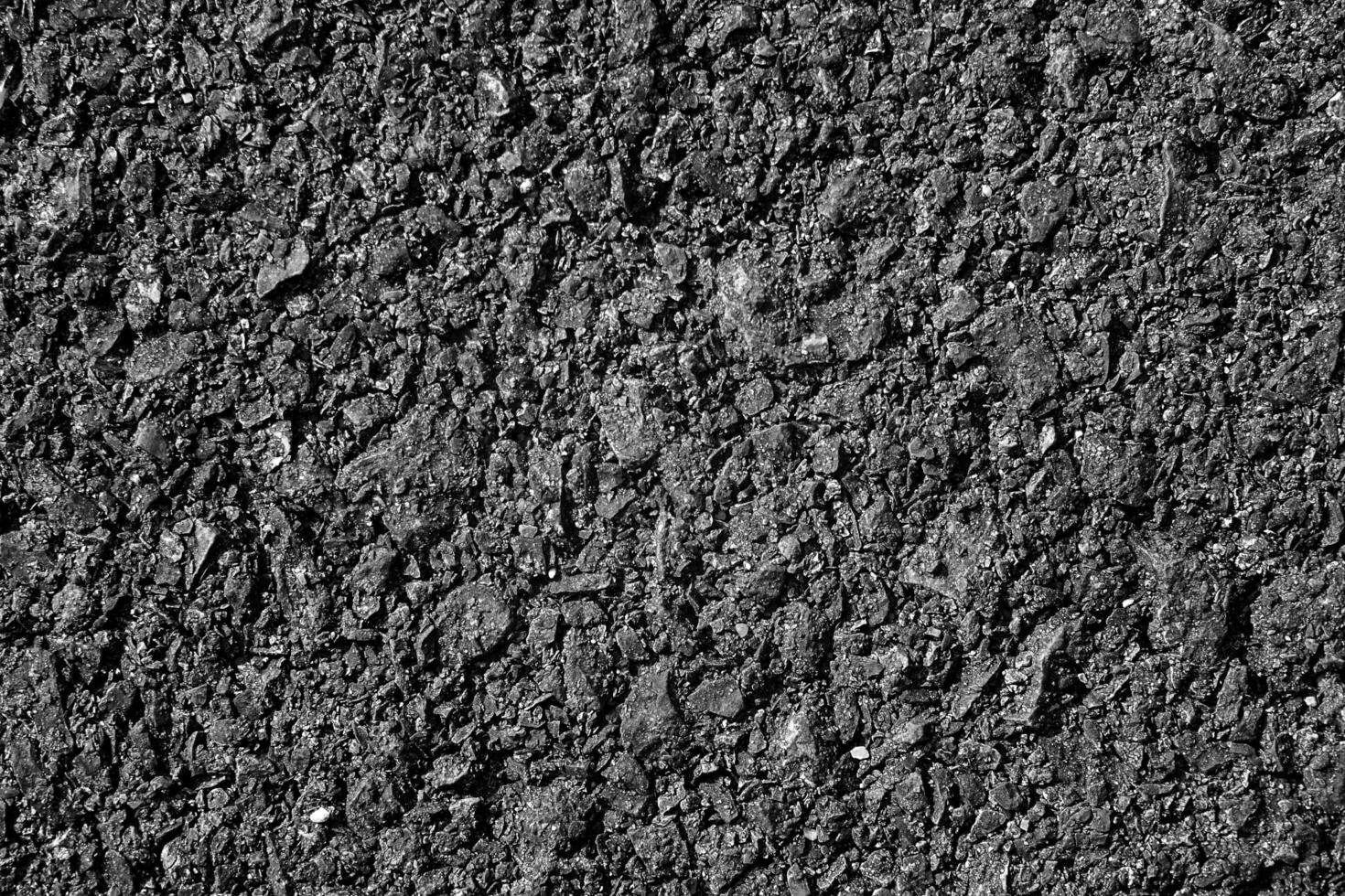 donker structuur details van oppervlakte van asfalt of tamac Aan nieuw weg, achtergrond of behang, meteriaal cpncept ontwerp foto