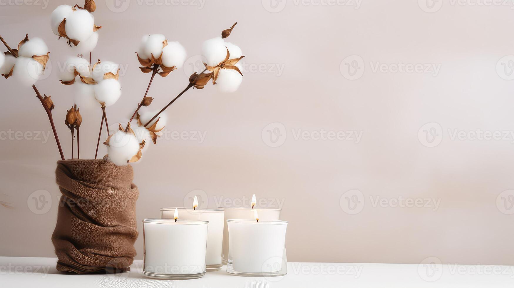 ai gegenereerd brandend kaarsen en katoen bloemen Aan wit houten tafel in kamer. foto