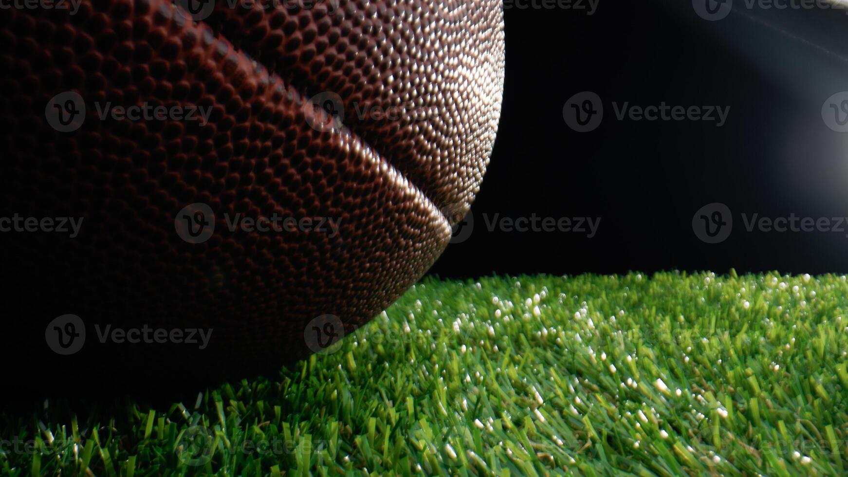 Amerikaans voetbal bal onder stadion lichten foto