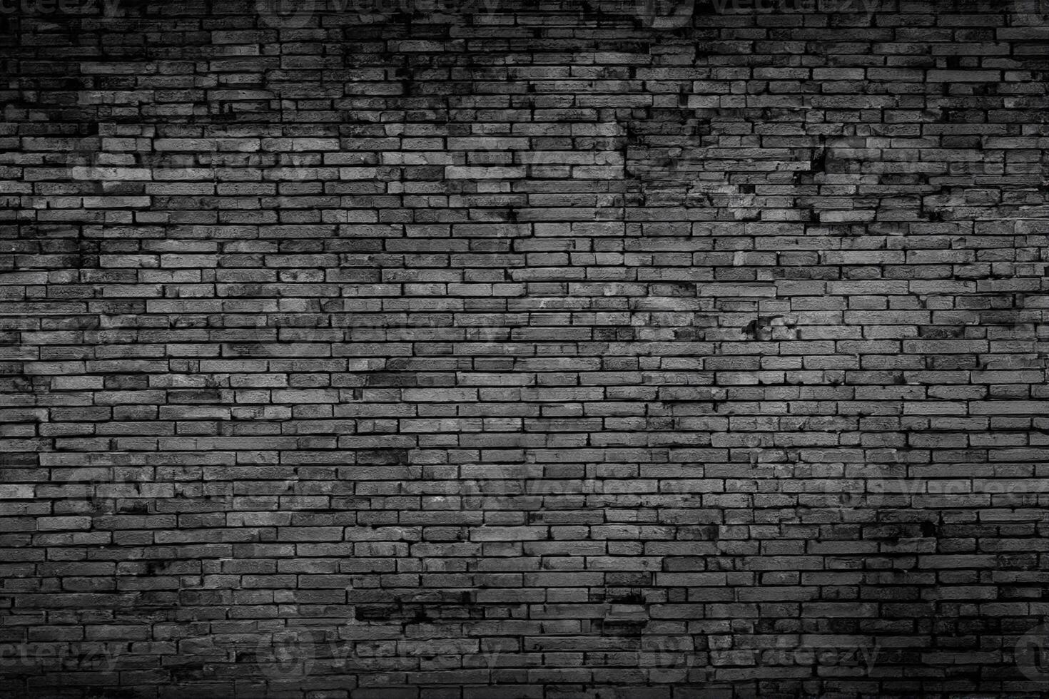 rauw ongepleisterd zwart steen muur structuur foto