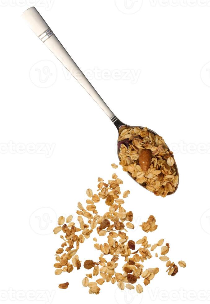 havermout, rozijnen en amandelen. muesli in metaal lepel foto