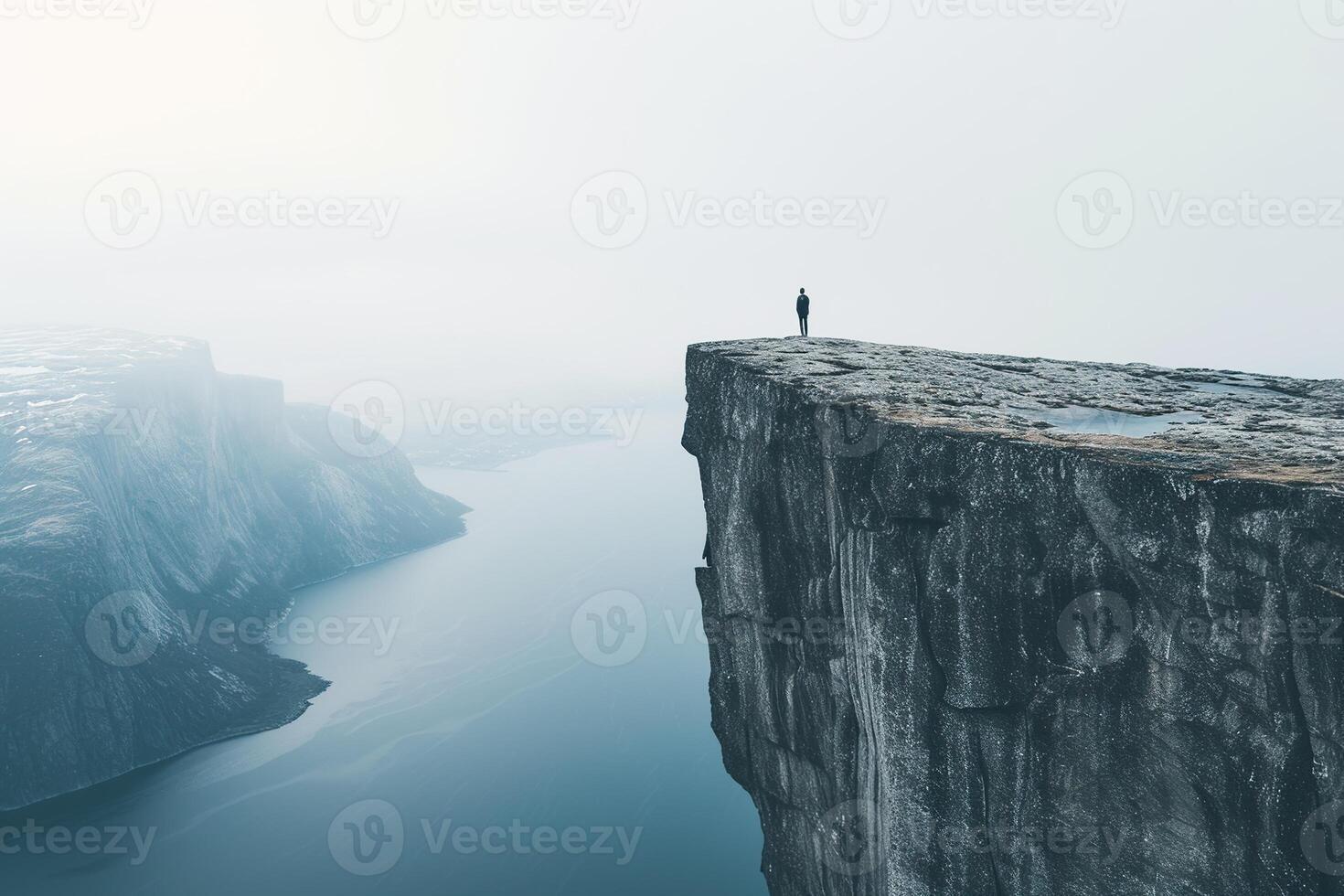 ai gegenereerd Mens staand Aan de rand van klif Bij zonsopkomst. foto