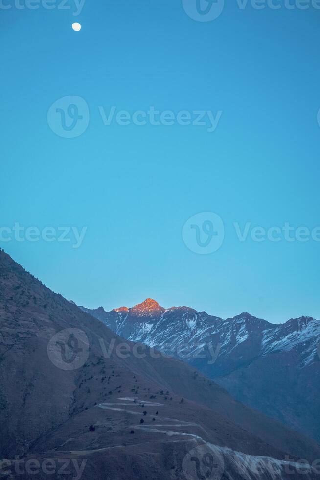 zonsondergang gekust Himalaya foto