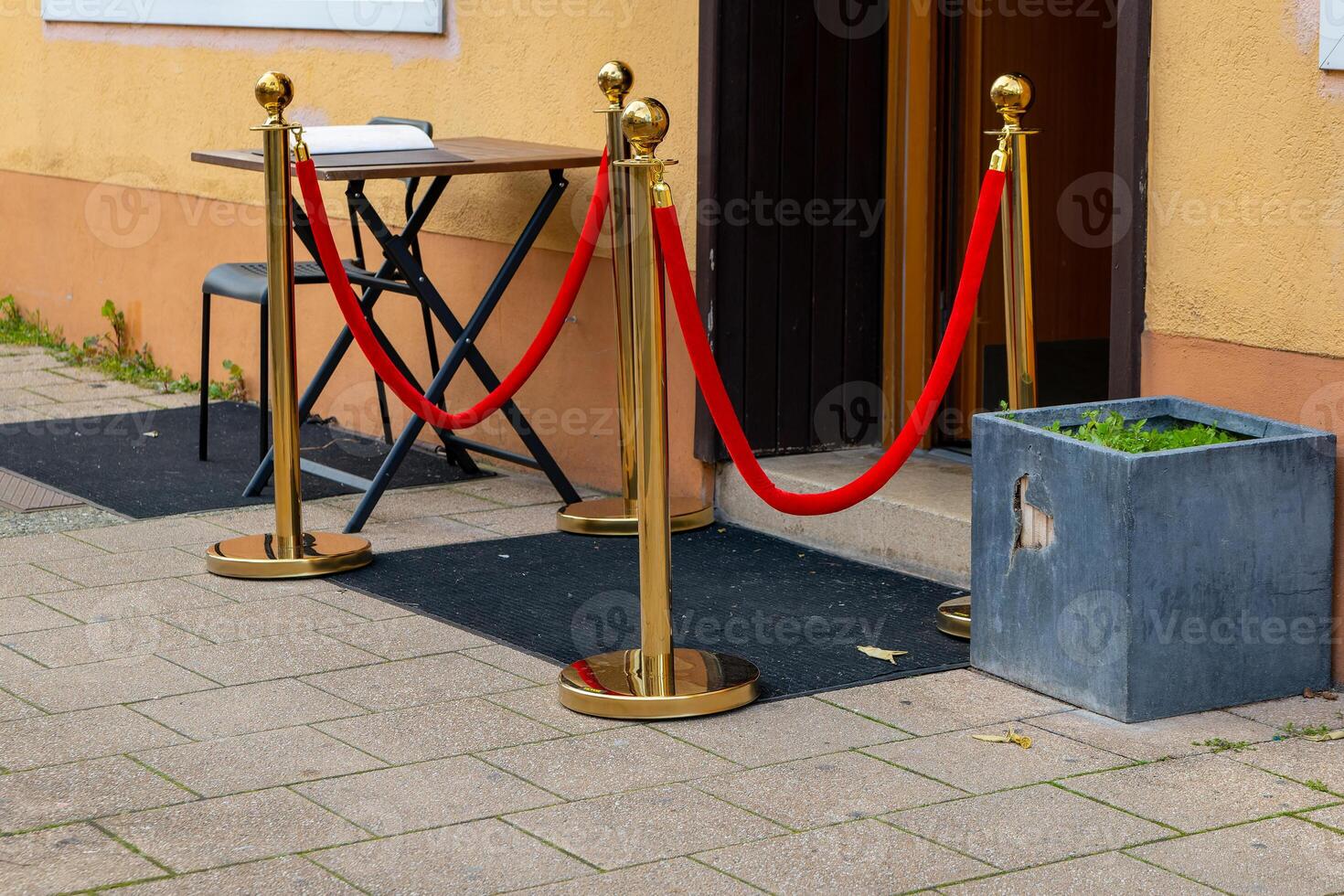 Ingang Oppervlakte met gouden staat en rood linten foto