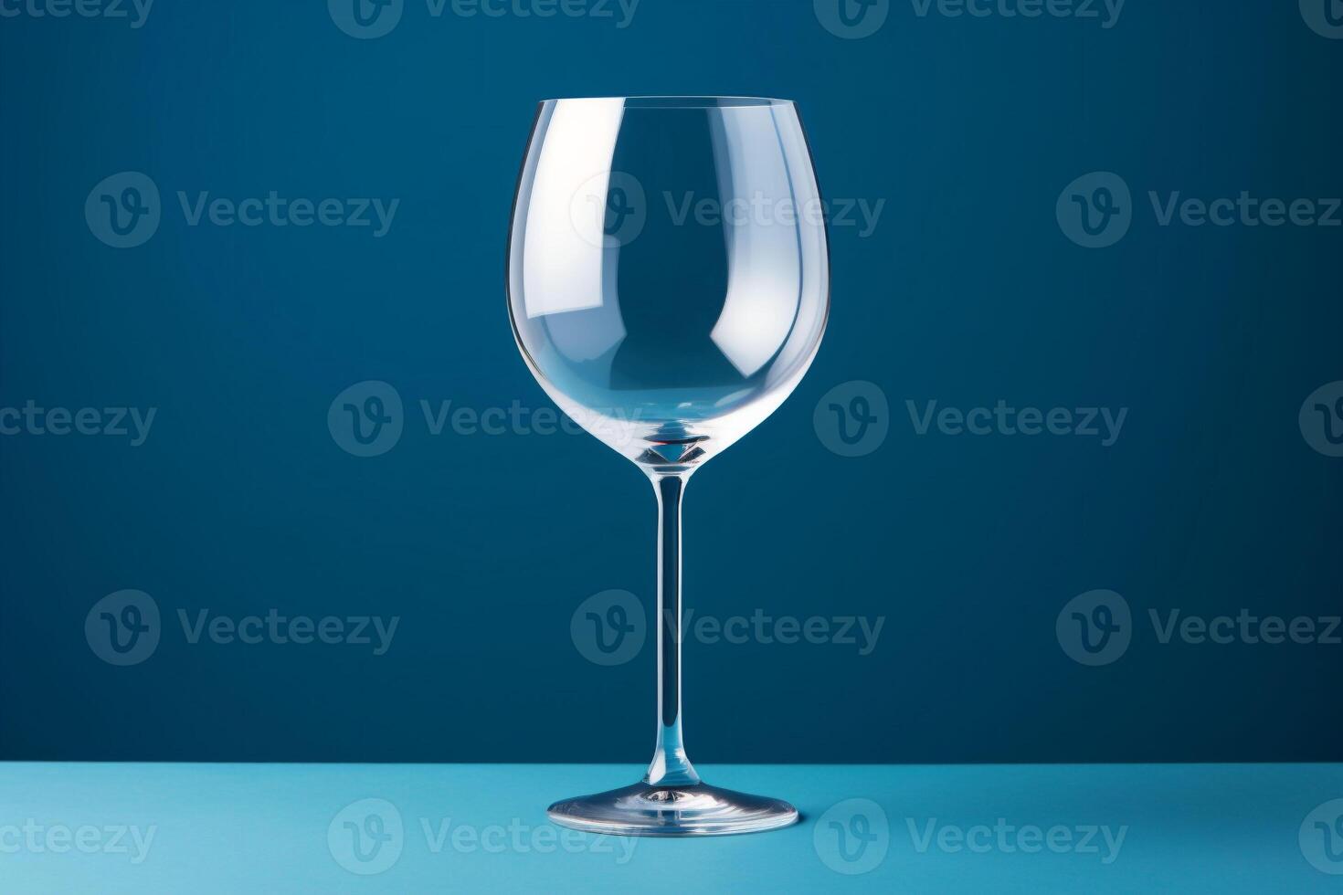 ai gegenereerd een single geïsoleerd wijn glas Aan een blauw oppervlakte reflecterend de omgeving en achtergrond. kopiëren ruimte. foto