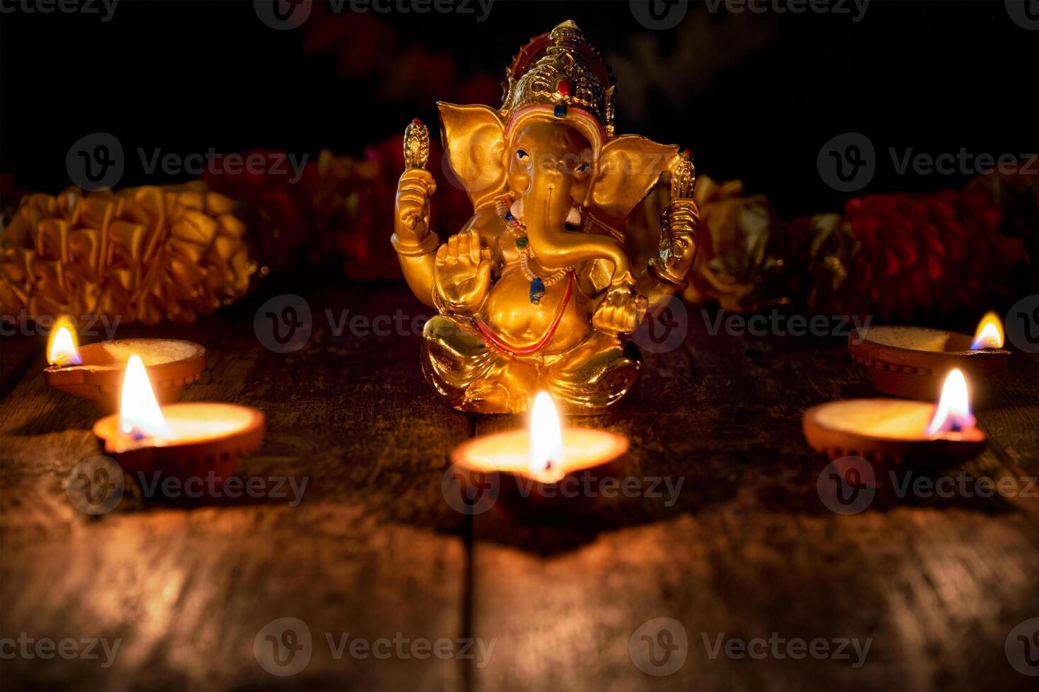 ganesha met diwali lichten foto