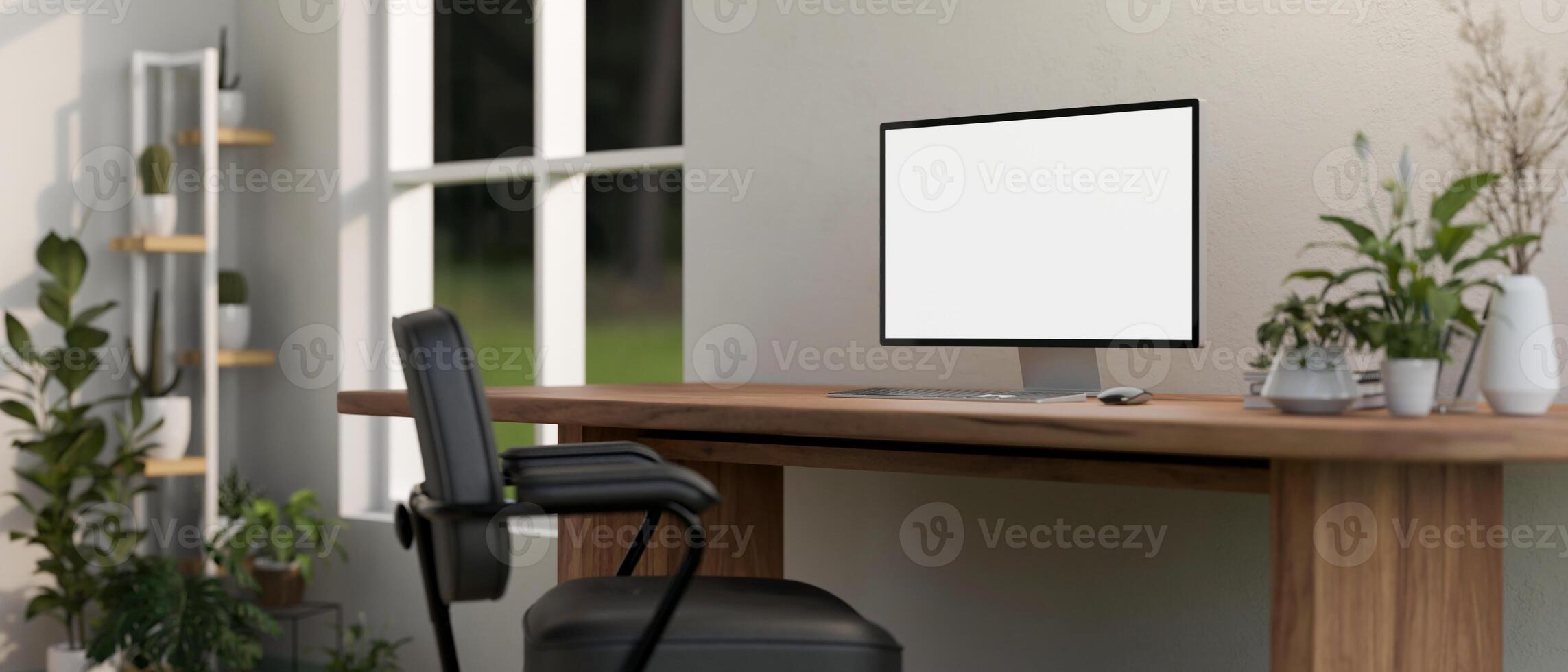 een computer mockup Aan een rustiek hout computer bureau in een minimalistische huis kantoor met kamerplanten. foto