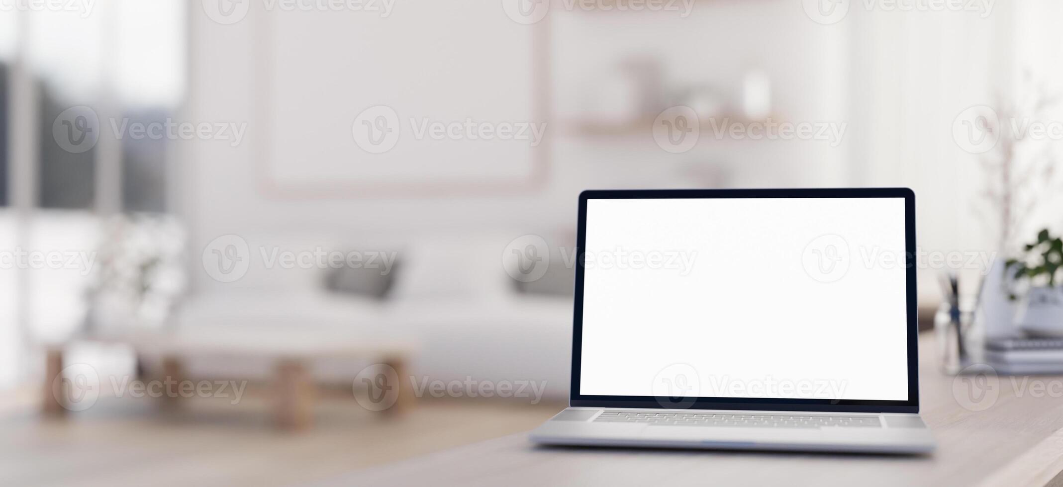 een detailopname beeld van een laptop computer mockup Aan een tafel in een luxueus hedendaags leven kamer. foto