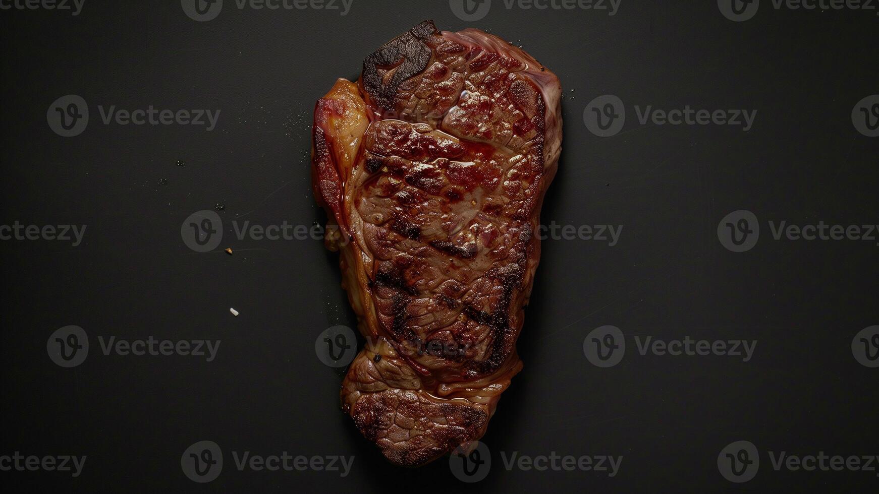gegrild t-bone steak Aan een zwart achtergrond. top visie. foto