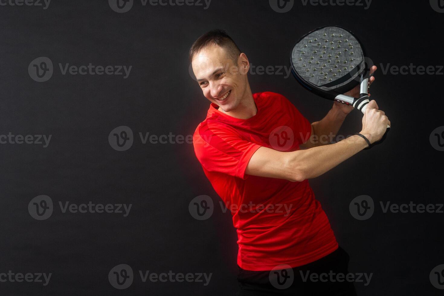 peddelen tennis. Mens, speler met hand- en paddel racket en bal foto