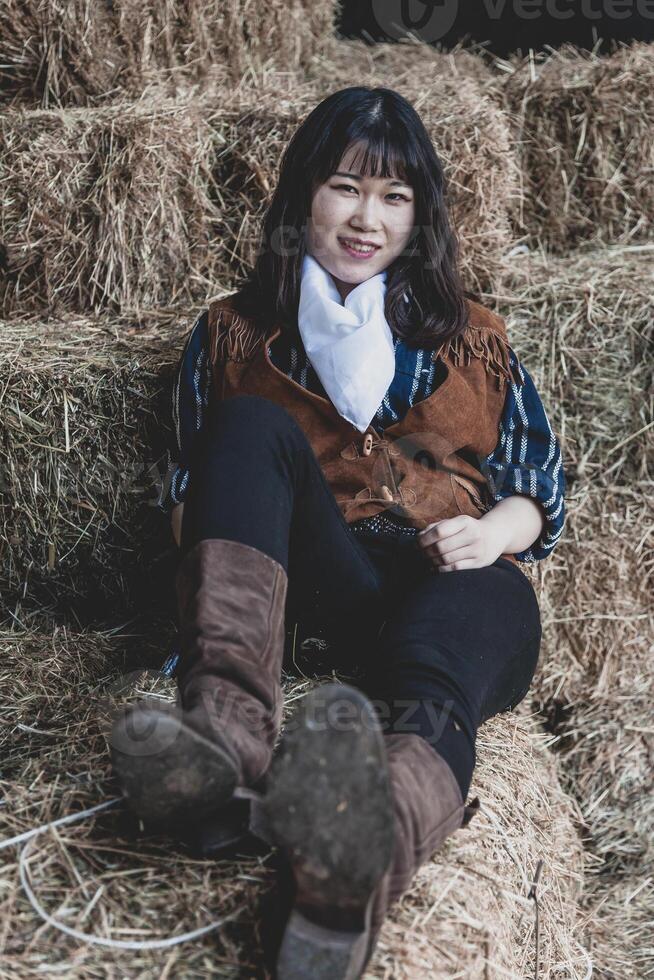 portret van een mooi gewapend Chinese vrouw veedrijfster foto