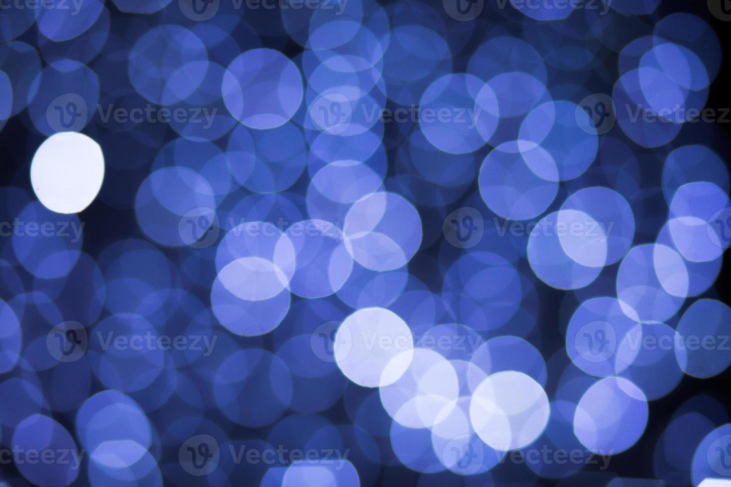 wazig kerstmis blauwe lichten bokeh 's nachts foto