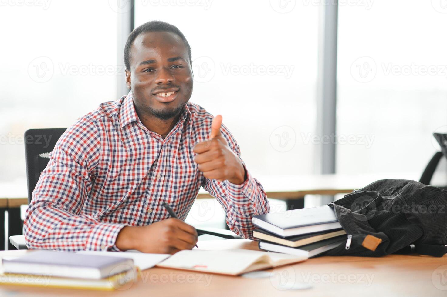 Afrikaanse Amerikaans leerling voorbijgaan tentamen foto