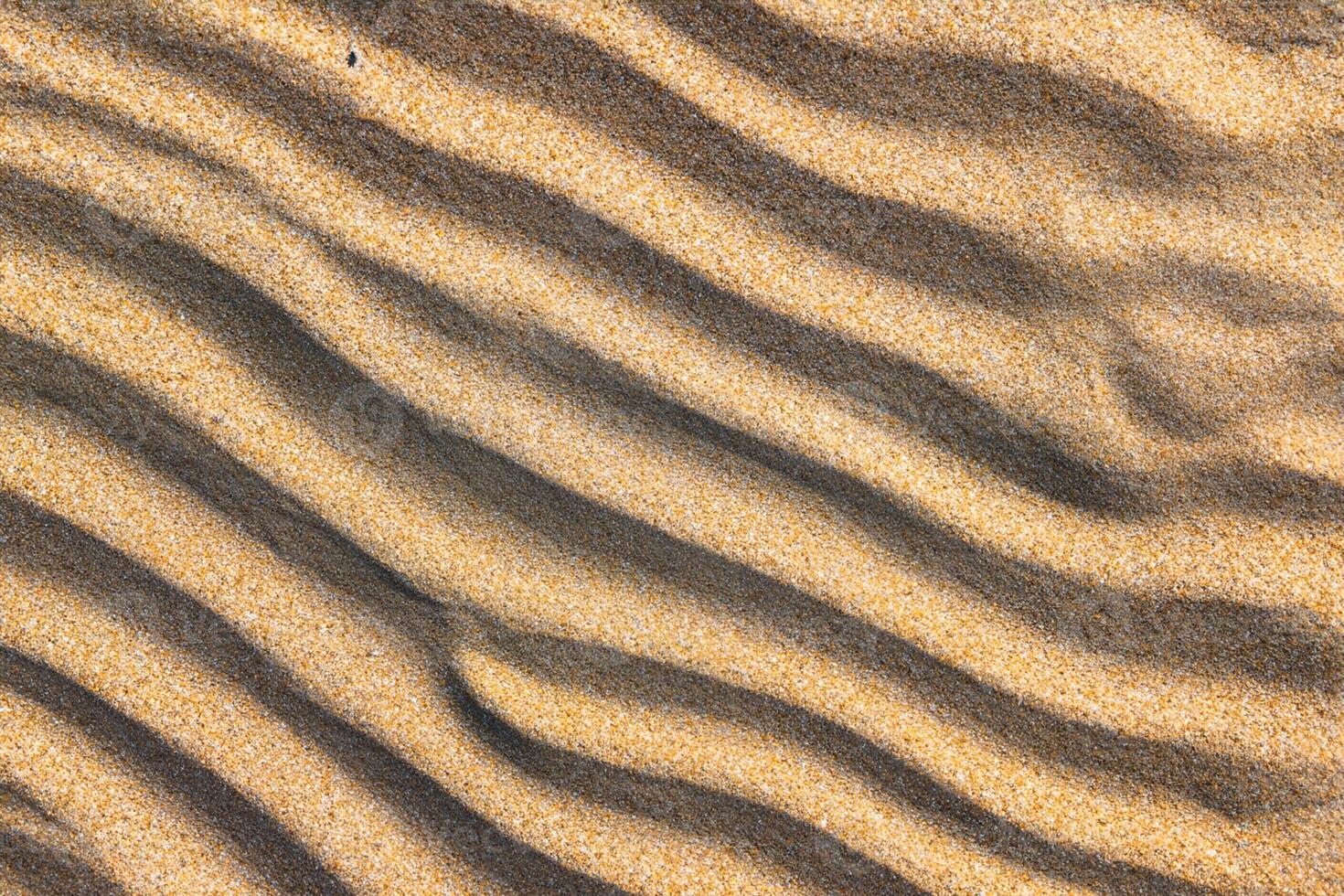 zand van kalmte omarmen de schoonheid van natuurlijk motief zand, een rustig tapijtwerk van van de aarde patronen foto