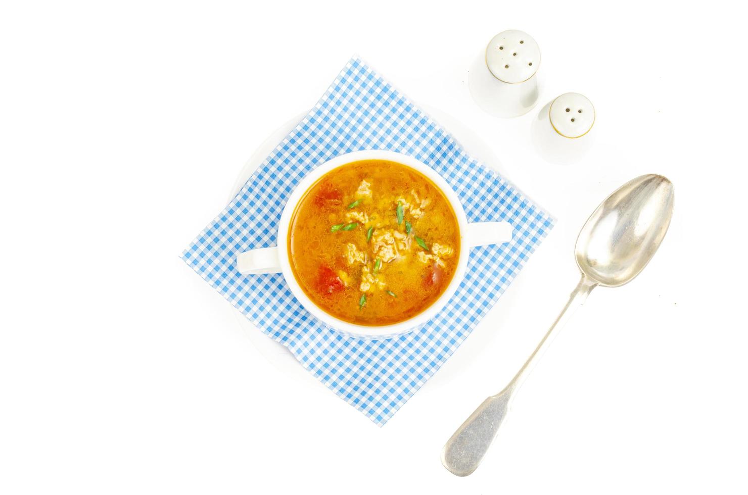 dikke huisgemaakte groentesoep met rijst, pompoen en tomaten foto