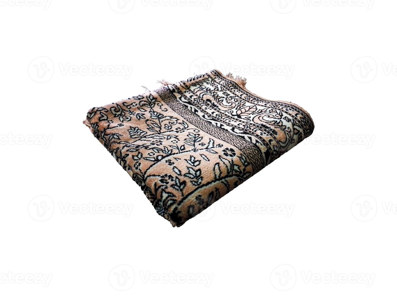 gevouwen moslim gebed mat gebruikt naar betalen Aan wit achtergrond foto