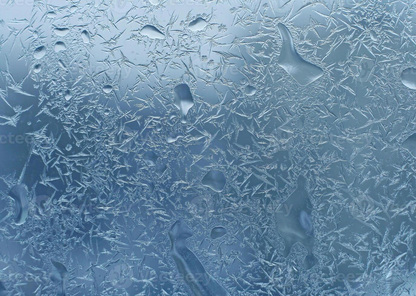 ijs en water druppels Aan glas, detailopname natuurlijk structuur foto