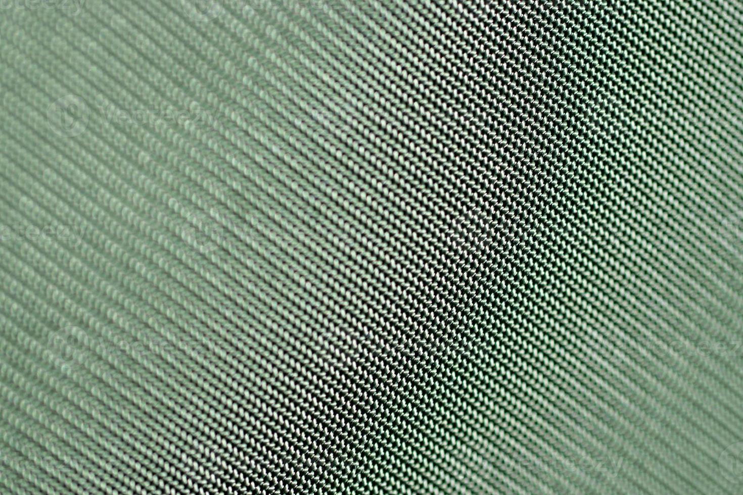 groene matte achtergrond van linnen stof, close-up. doek textuur .abstract groene achtergrond. foto